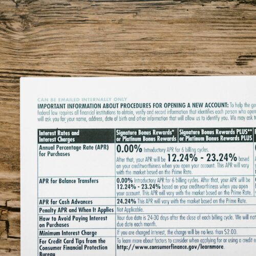 White Printer Paper on Brown Wooden Table