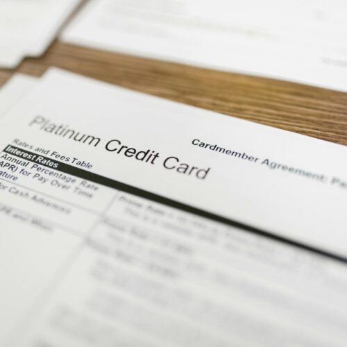 White Printer Paper on Brown Wooden Table